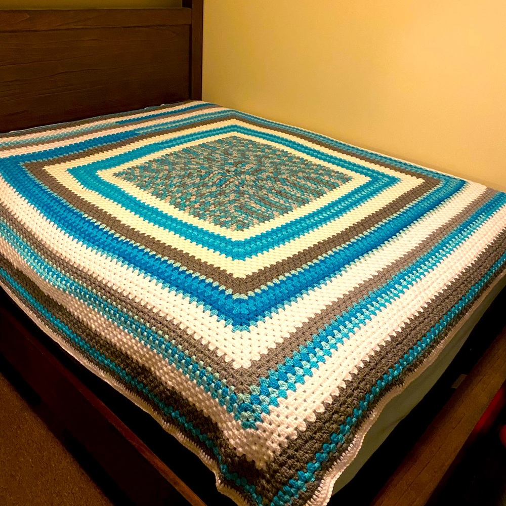 Hand made blanket fits a queen size bed. Just made brand new.